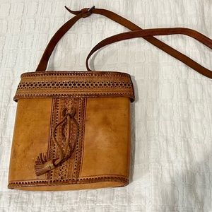 Vintage tooled leather crossbody bag